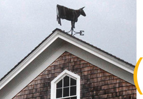 Cow weathervane by Travis Tuck, 2001. Photo by Maggie Holtzberg.