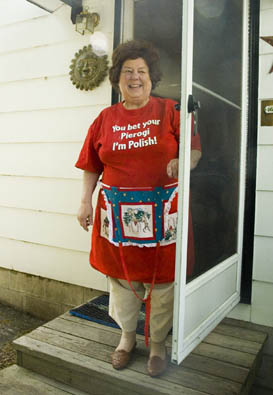 Dottie Naruscewicz Flanagan standing in her doorway, Polish Pierogi, 2011; Dorothy Naruscewicz Flanagan; Lowell, Massachusetts; Photography by Maggie Holtzberg