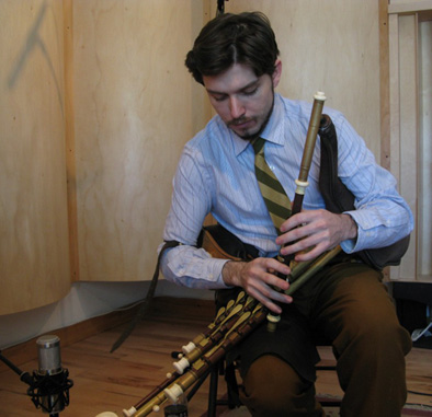 Joey Abarta playing the uilleann pipes, Irish musician, 2014; Roxbury, Massachusetts;