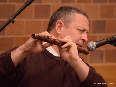 Jimmy Noonan performing at Boston College, 2014. Photo credit Paul Wells, Irish flute and penny whistle player, 2014; James Noonan; Holbrook, Massachusetts;