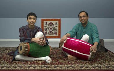Apprentice Ullas Rao with Pravin Sitaram, South Indian mridangam, 2009; Westwood, Massachusetts; Photography by Maggie Holtzberg